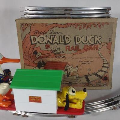1989 Pride Lines Donald Duck Rail Hand Car, #1107 toy train with track, original box, and Pride Lines LTD paperwork. Made by Pride Lines...