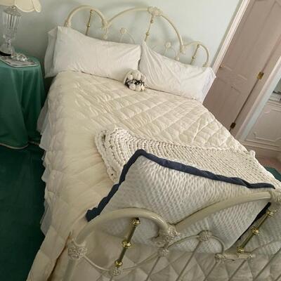 Queen bed with white iron bedframe