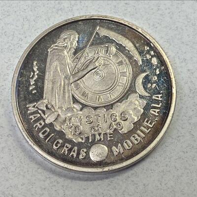 https://www.ebay.com/itm/125470915405	MYSTICS OF TIME 1988 .999 Fine Silver MOBILE Mardi Gras Doubloon Coin Token A322 		Auction Starts...