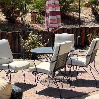 Vintage Wrough Iron Patio Dining Set wit Umbrella and 4 Chairs  Table 41"x29"   Umbrella 96" tall.  Chairs...