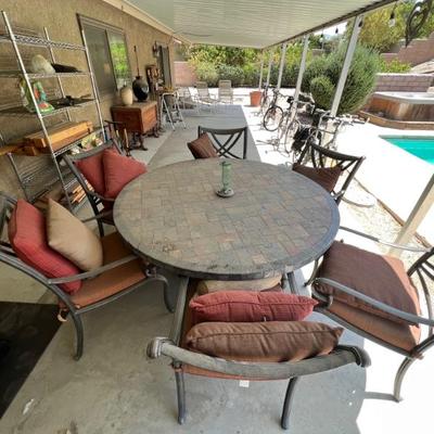 Available for immediate Pre Sale.  TEXT 760-668-0554 to purchase.  ZELLE ONLY
Patio Set Tile Top With 6 Metal Chairs    Table 64" in...