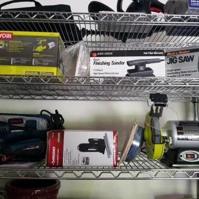 Assorted tools - jigsaw, sander, grinder, more