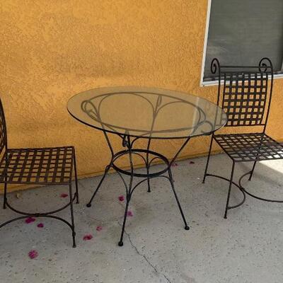 ITEM IS AVAILABLE FOR PURCHASE NOW.  TEXT 760-668-0554 TO PURCHASE.  WE ACCEPT ZELLE ONLY 
Wrought Iron Bistro Patio Set.  Table and Two...
