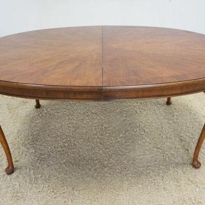 1135	OVAL WALNUT BANDED DINING TABLE WITH 2 LEAVES BY WHITE FURNITURE CO, APPROXIMATELY 79 IN X 46 IN X 30 IN HIGH, LEAVES 22 IN EACH

