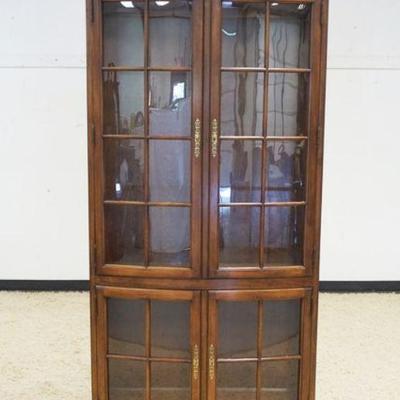 1137	WALNUT 4 DOOR CURIOR CABINET WITH INTERIOR LIGHTS, APPROXIMATELY 42 IN X 13 IN X 81 IN HIGH
