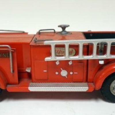 1099	ANTIQUE TOY METAL FIRE TRUCK BY MODEL TOYS, CHARLES WM DOERKE CO., APPROXIMATELY 19 IN X 7 IN X 7 IN HIGH

