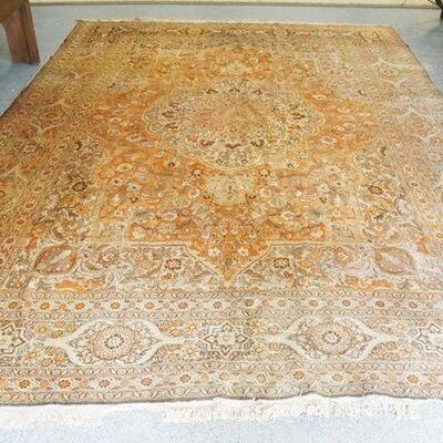 1015	PERSIAN RUG, APPROXIMATELY 13 FT X 9 FT, HAS WEAR W/HOLES
