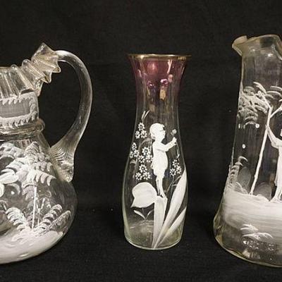 1262	LOT OF 3 PIECES ANTIQUE CLEAR ENAMELED GLASS MARY GREGORY INCLUDING 2 PITCHERS & BUD VASE, APPROXIMATELY 9 3/4 IN HIGH
