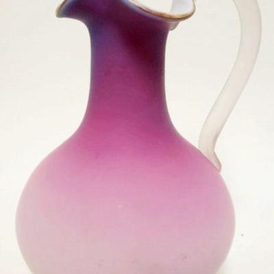 1235	PINK CASED SATIN GLASS BLOWN GLASS PITCHER, APPROXIMATELY 11 IN HIGH
