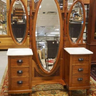 1004	CONTINENTAL MAHOGANY MARBLE TOP VANITY, 6 DRAWERS W/2 PIIVOTING MIRRORS, APPROXIMATELY 53 IN X 17 IN X 68 IN HIGH
