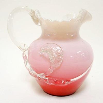1234	VICTORIAN PINK CASE BLOWN GLASS PITCHER W/APPLIED GLASS DECORATION. APPROXIMATELY 8 1/4 IN HIGH
