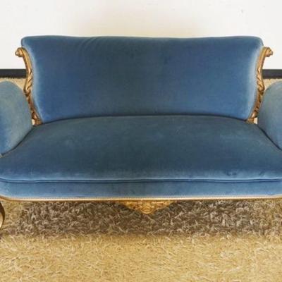 1133	FRENCH PROVINCIAL UPHOLSTERED SOFA, HAVING A CARVED FRAME IN GOLD FINSIH, 57 IN X 27 IN X29 IN
