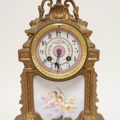 1116	FRENCH MANTLE CLOCK IN BRONZE CASE WITH PORCELAIN CLOCK FACE AND LOWER PLAQUE, APPROXIMATELY 17 IN HIGH
