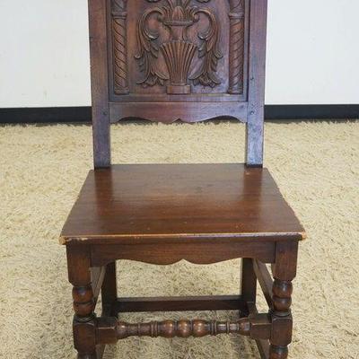 1123	WALNUT CARVED SIDE CHAIR, SOLID BACK, HAVING CARVED URN WITH FLOWERS
