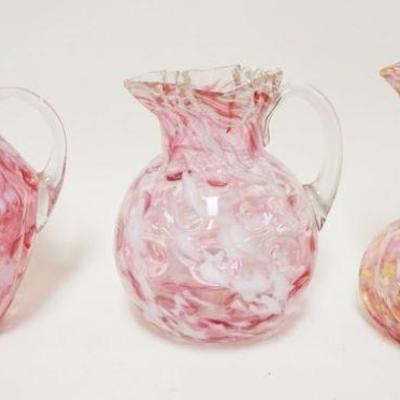 1226	GROUP OF 3 VICTORIAN SPATTER BLOWN GLASS PITCHERS INCLUDING NORTHWOOD, APPROXIMATELY 8 1/4 IN HIGH
