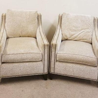 1054A	PAIR OF UPHOLSTERED MODERN SWIVEL CHAIRS	PAIR OF UPHOLSTERED MODERN SWIVEL CHAIRS W/CURVED TAPERED BACKS, GEOMETRIC PATTERN ON...