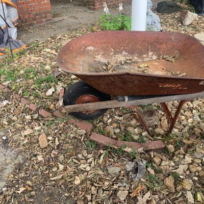 Old rusted wheel barrel 