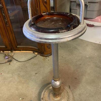 old amber glass ashtray on metal stand