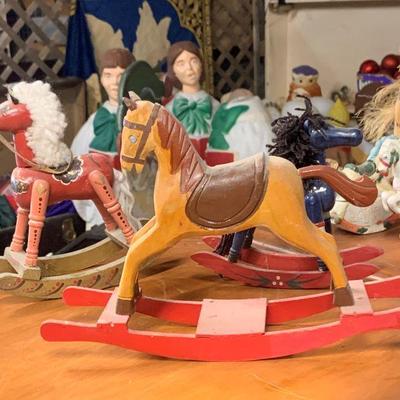 several wooden carousals 