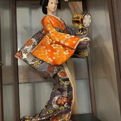 Oriental doll in case