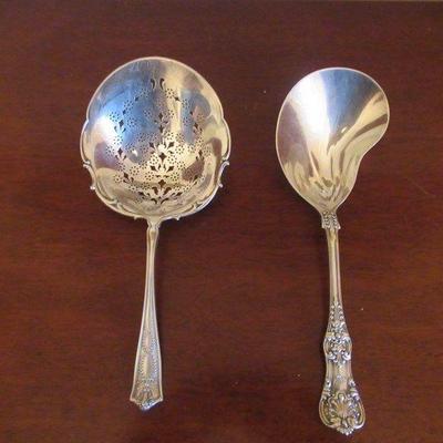 TWO GORGEOUS STERLING SILVER SERVING SPOONS MADE FOR AND SOLD BY THE TIFFANY CO.