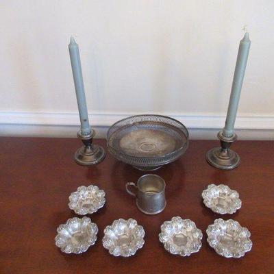 TEN PIECES OF STERLING SILVER CONSISTING OF CANDLESTICKS FINGER BOWLS CUP SERVING DISH