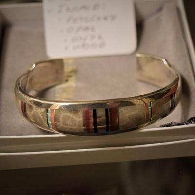Signed LMC Cuff inlaid with Petoskey Stone, Opal, Wood, Onyx and more