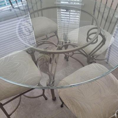 Nook or dining room table and four chairs, glass top