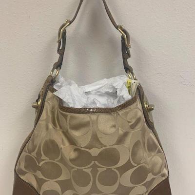 https://www.ebay.com/itm/115505150246	VC6002 Coach Brown Leather and Beige Logo Canvas  Bag		Auction
