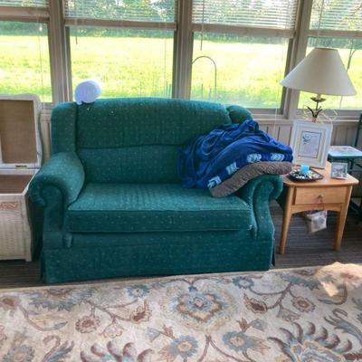 loveseat in sunroom