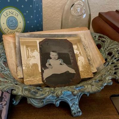 Antique tin-type photographs and postcards