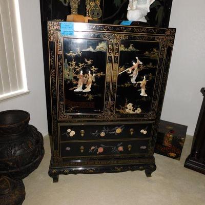 Black Lacquer cabinet with Mother of Pearl carvings 