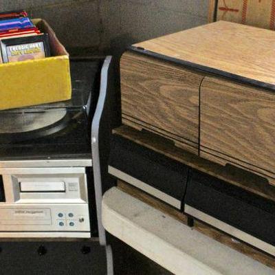 Vinyl records, cassette tapes, and 8 track tapes, plus storage drawers for cassettes and 8 tracks.