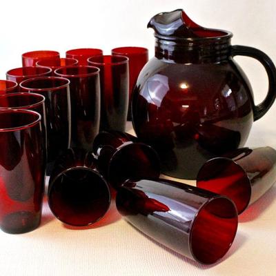 Extensive collection of glassware, including this vintage Anchor Hocking ball pitcher and tumblers in Ruby Red.