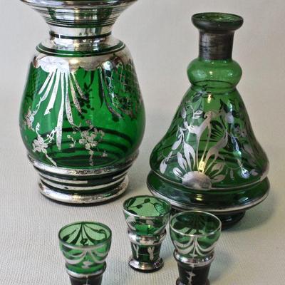 Green glass vase, decanter & cordials with silver overlay.