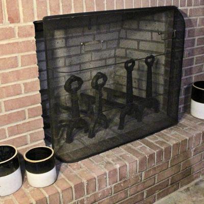 Andirons and fireplace screen.