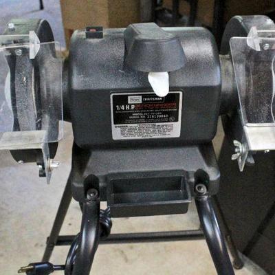 Craftsman Bench Grinder - Model 257.191200 - 6" x 1/2" grinding wheel, sits on grinder stand.