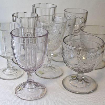 Assorted Early American Pattern Glass goblets in intriguing designs. 