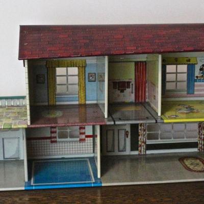 Vintage Marx tin litho dollhouse with child's Disney theme bedroom - upper right.
