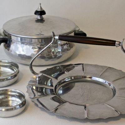 Pewter porringers by Stieff for Colonial Williamsburg, Bruce Hunt vintage serving tray with handle, and 1960s MMM aluminum server with...