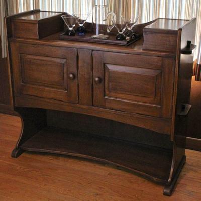 Unusual solid-wood sideboard with twin boxes on top, two door cupboard in the middle, and lower shelf.