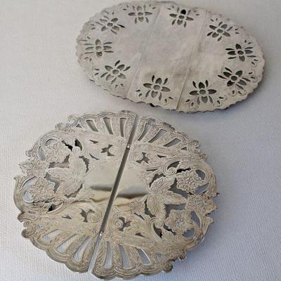 Silver plated expandable trivets - pull apart for larger casserole dishes, push together for smaller ones.
