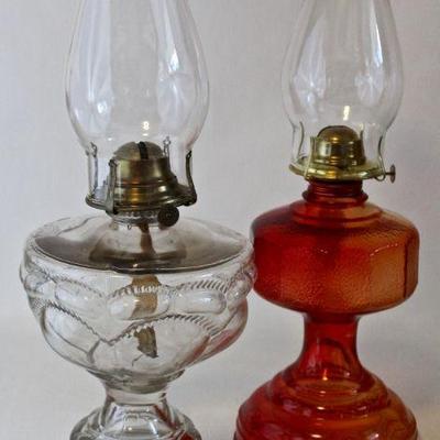 Glass oil lamps.