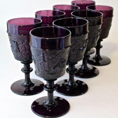 Set of 8 purple Westward Ho pattern glass goblets.
