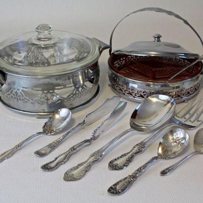 Silver plated serving dishes, silver plated serving utensils.