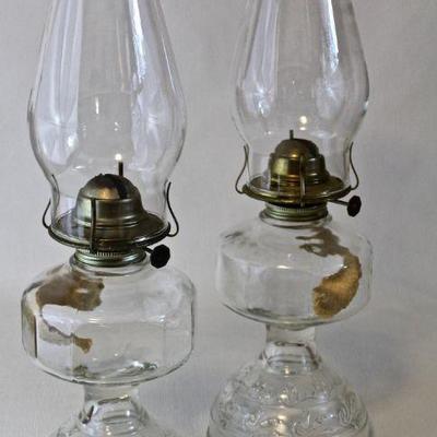 Pair of matching oil lamps.