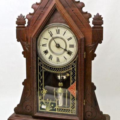Antique kitchen clock bt Jerome & Co., walnut case.