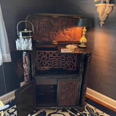 Asian black lacquer and wood carved bar/cabinet