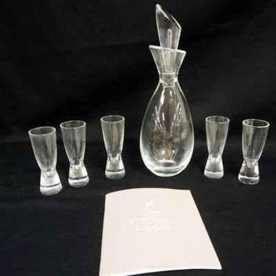 1155	STEUBEN CLEAR GLASS DECANTER AND GLASSES	STEUBEN CLEAR GLASS DECANTER WITH 5 GLASSES, APPROXIMATELY 11 1/4 IN HIGH
