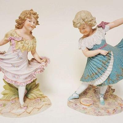 1143	2 LARGE ANTIQUE VICTORIAN BISQUE FIGURES	2 LARGE ANTIQUE VICTORIAN BISQUE FIGURES OF 2 YOUNG GIRLS DANCING, APPROXIMATELY 16 IN HIGH
